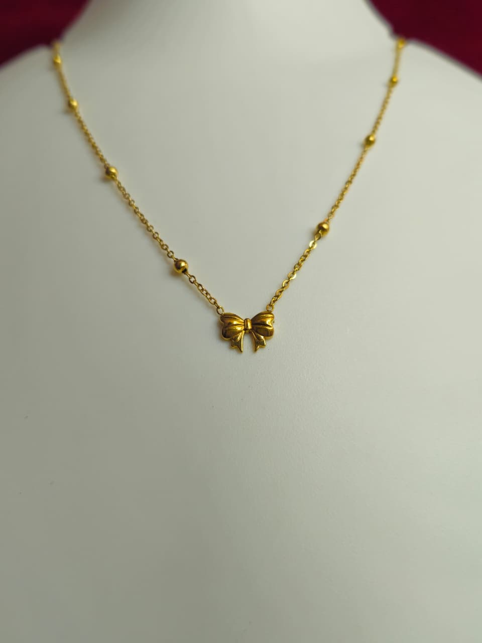 Golden Bow Charm Necklace