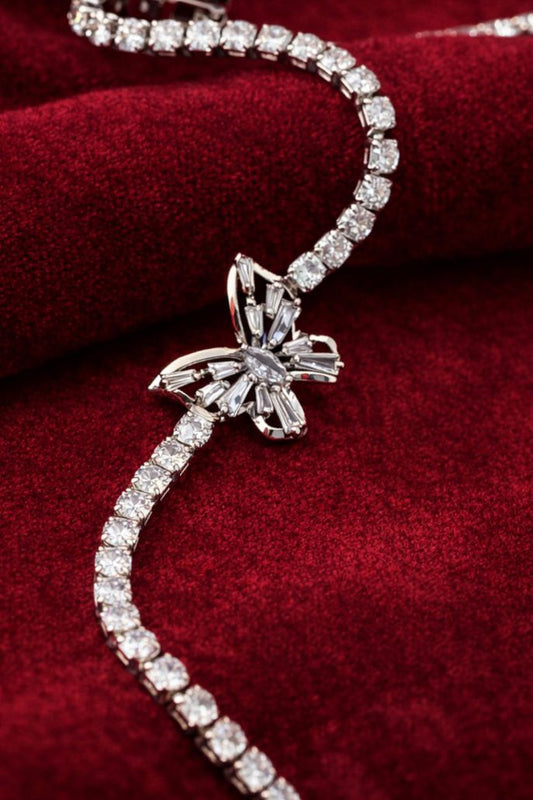 Silver crystal tennis bracelet with butterfly charm