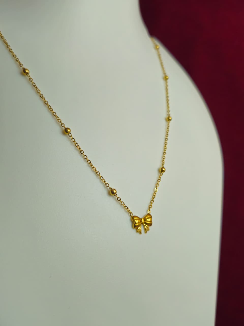 Golden Bow Charm Necklace