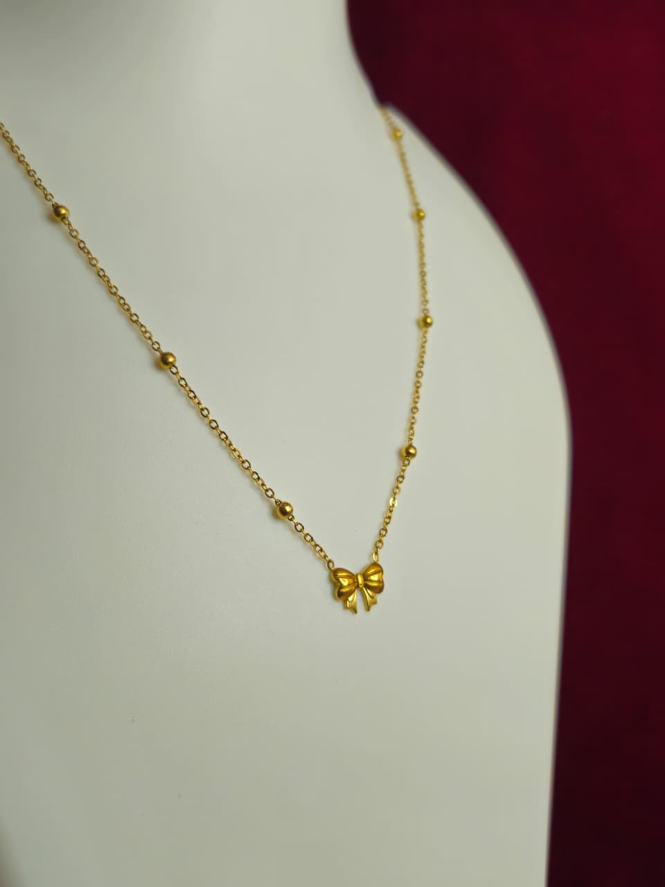 Golden Bow Charm Necklace