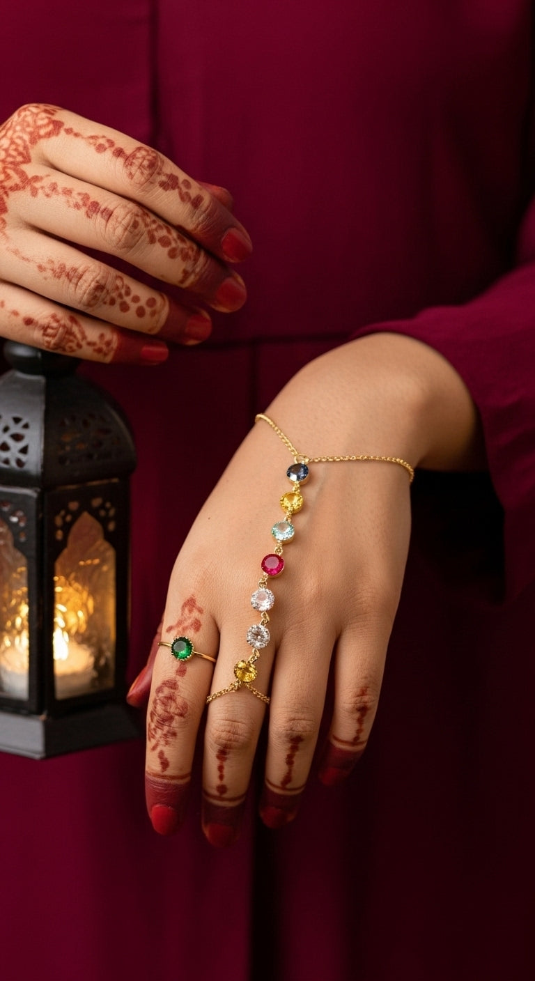 Multicolor crystal gold hand chain bracelet worn on woman hand with mehndi
